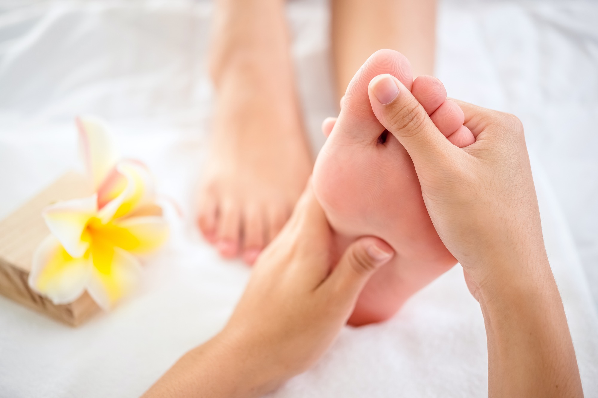 Foot massage in spa salon